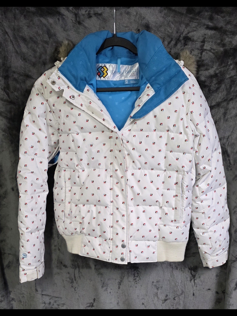 White Patterned Puffer Jacket with Bright Blue Lining
